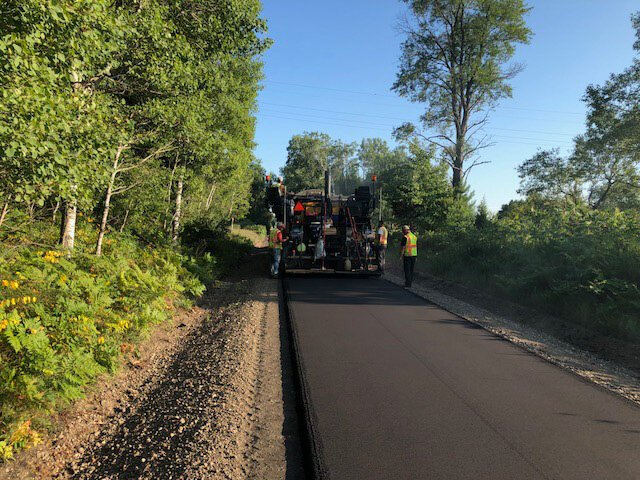 Paving the last section of the 92-mile-long White Pine Trail.