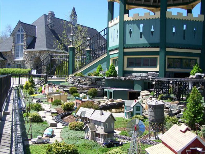 An outdoor miniature train garden was added by the Muellers.