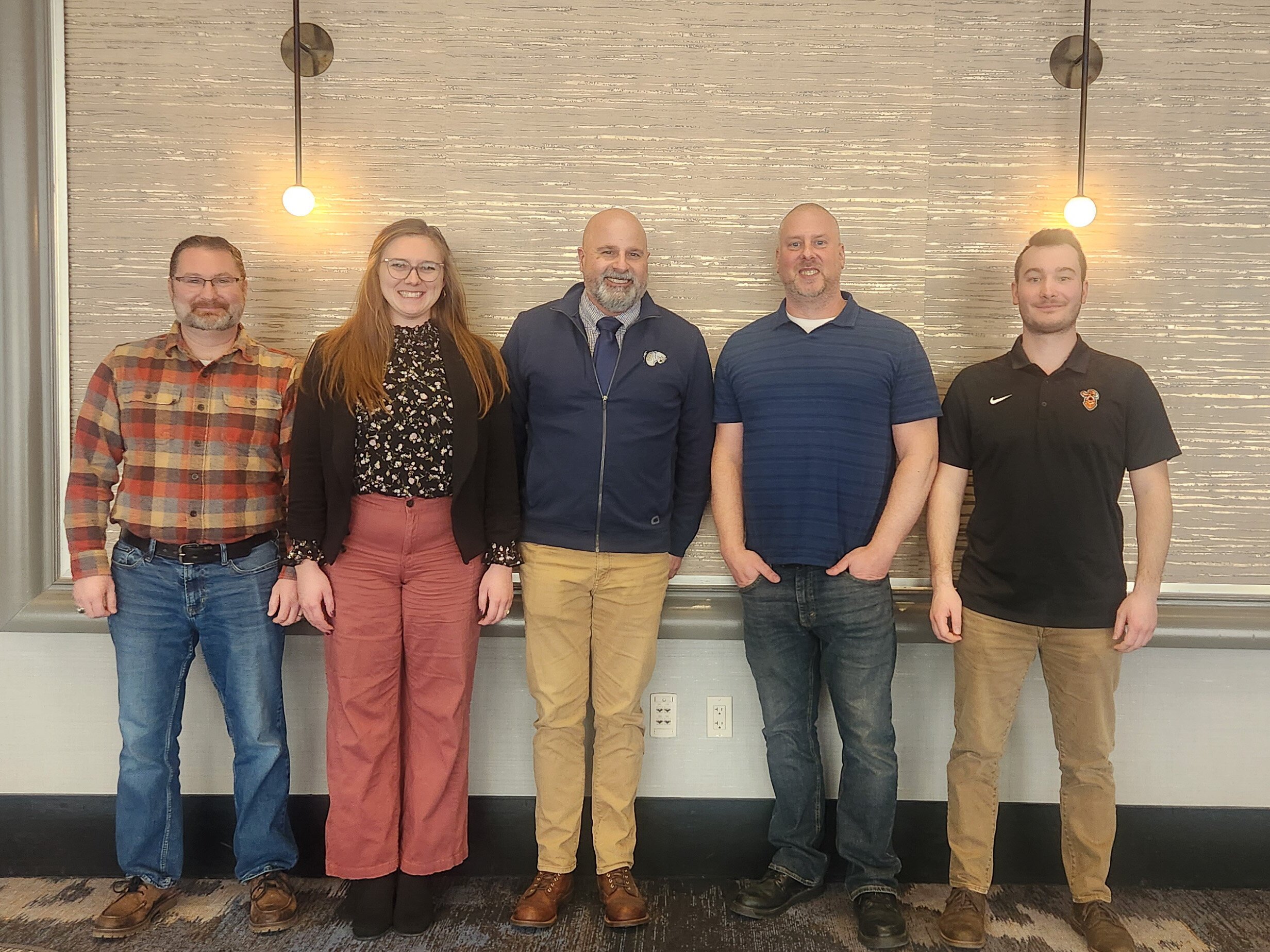 A panel at a staff retreat in Grand Rapids included apprentice teacher candidates and others. 
