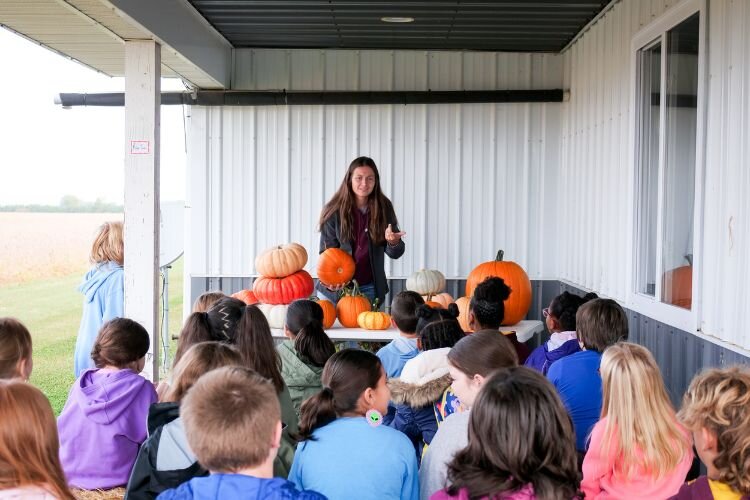 Riley Travis educated elementary students from Isabella County about pumpkins.