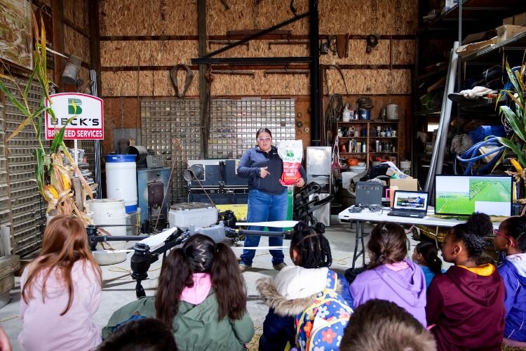 Ashleigh Bryant shows students how drone technology helps farmers solve issues by gathering aerial photos—plus how drones can be used for seeding.