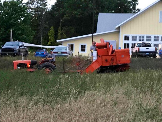 A combine harvests barley at Brewery Terra Firma. The barley was used for a Trappist beer. 