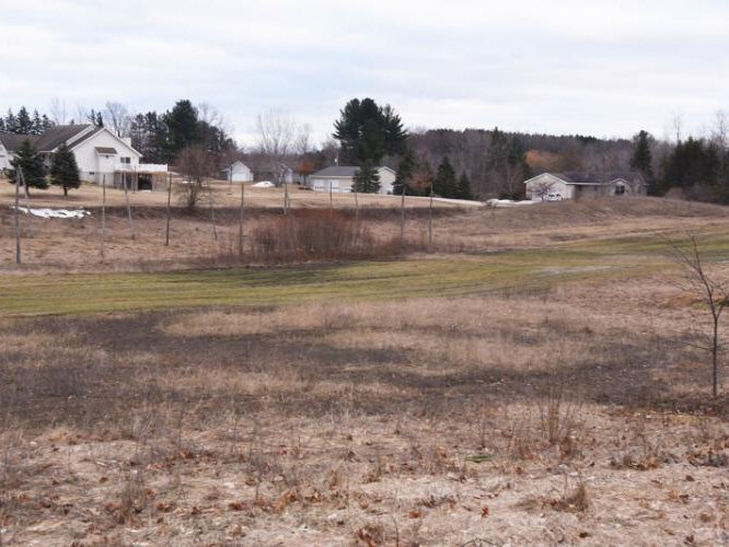A view of the sleeping farm in winter. 