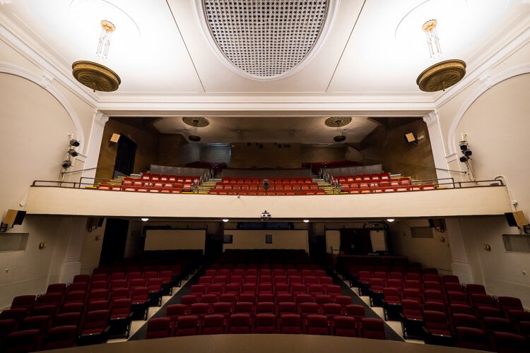 First-run movies are shown in the theater four days a week.