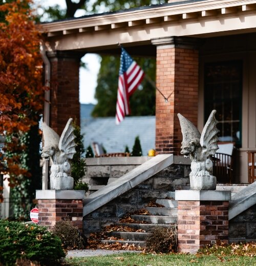 CANA President Margeaux Appold says architectural details on the exterior, such as these gargoyles at her home, inspire people to be curious about the interiors. In December, CANA offers the chance to step inside eight of Bay City's historic homes.