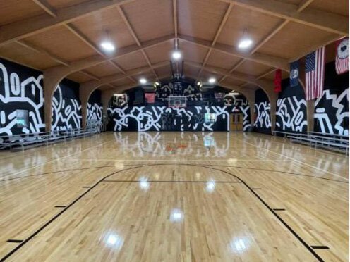 The mural inside the gym at The Opportunity Center @ ALCC.