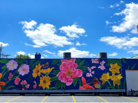 The mural by Ouizi at Tiffany's Pizza. 