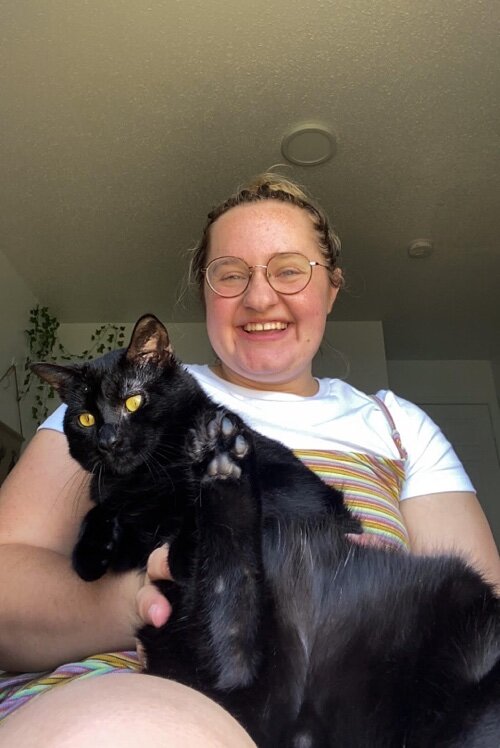 Lizzie lives in Mt. Pleasant with her cat, Toast, and her gecko, Kiwi.