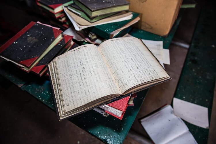 Before the city stopped using the building, they took time to close it up properly. That means there's little damage from animals or the weather. Even decades-old paper records are legible.