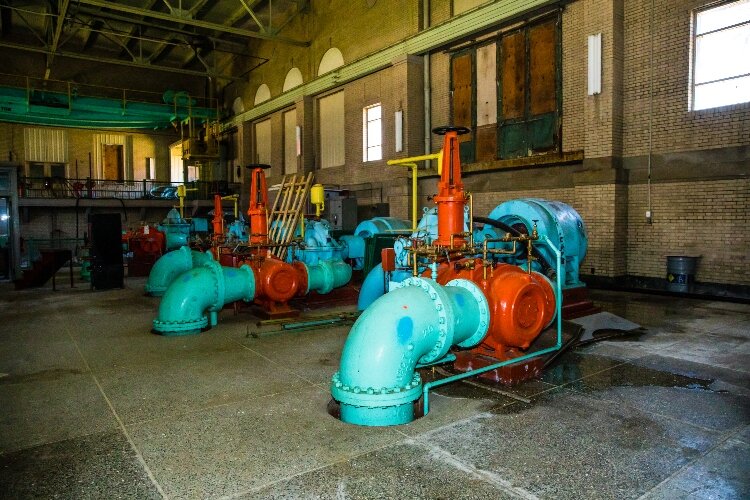 Most of the windows are boarded up, but it's not difficult to imagine the large main room filled with sunlight and people.