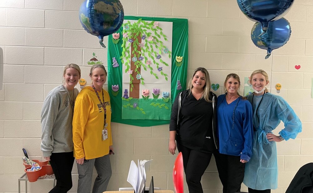 Members of the Cincinnati Health Department dental team, right to left: Kelsey McClanahan (CDA), Tricia Waddell (EFDA), Jessica Reverman (CDA), Joann Cox (CDA), and Dr. Lauren Goldman.