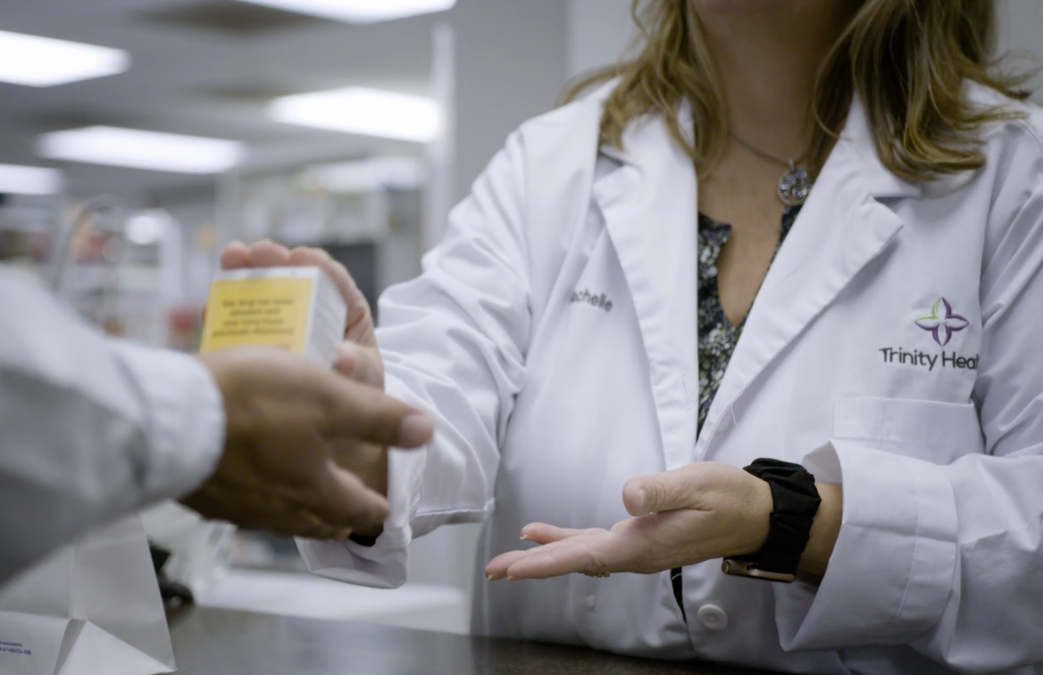 Pharmacists handle cancer medications at the cancer drug repository at the Trinity Health Reichert Medical Center in Superior Township.