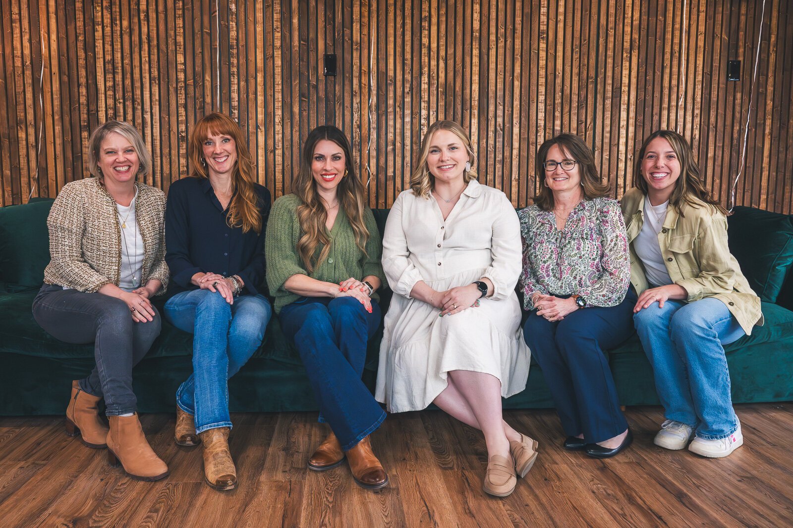 Jenny Silva, Niki Ardis, Hannah McNaughton, Paige Evans, Karen Watts, and Alex Wheeler at Metric Marketing's office in downtown Saline.