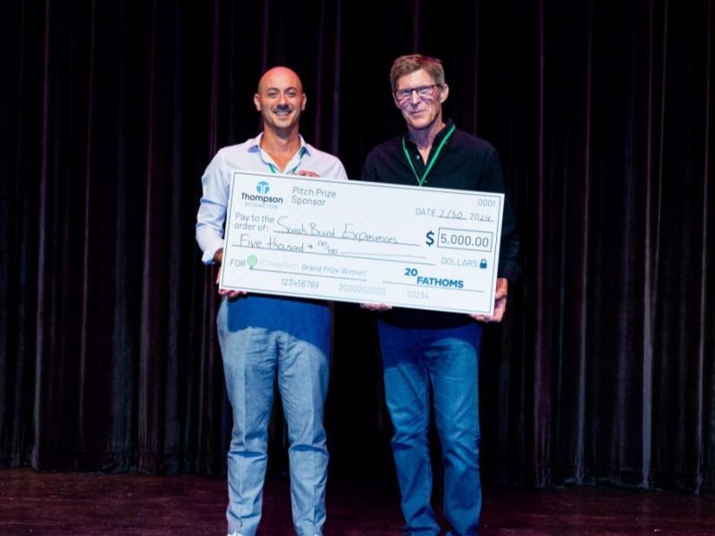 Adam Stave with Swish Brand Experiences accepts the First Place Award at the July 30 TCNewTech.