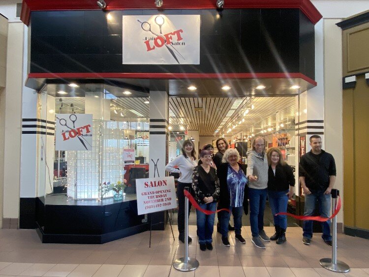 Ribbon cutting for The Hair Loft at the Midland Mall.