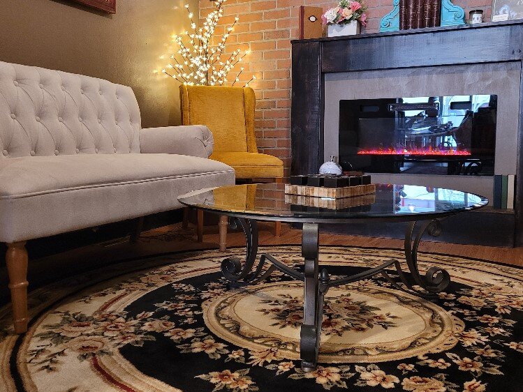 The Sitting Room provides a place for guests to relax and read.